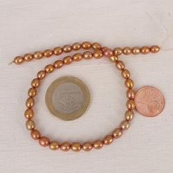 Schmuck DIY: Kurzstrang aus messingfarbener Perle, oval